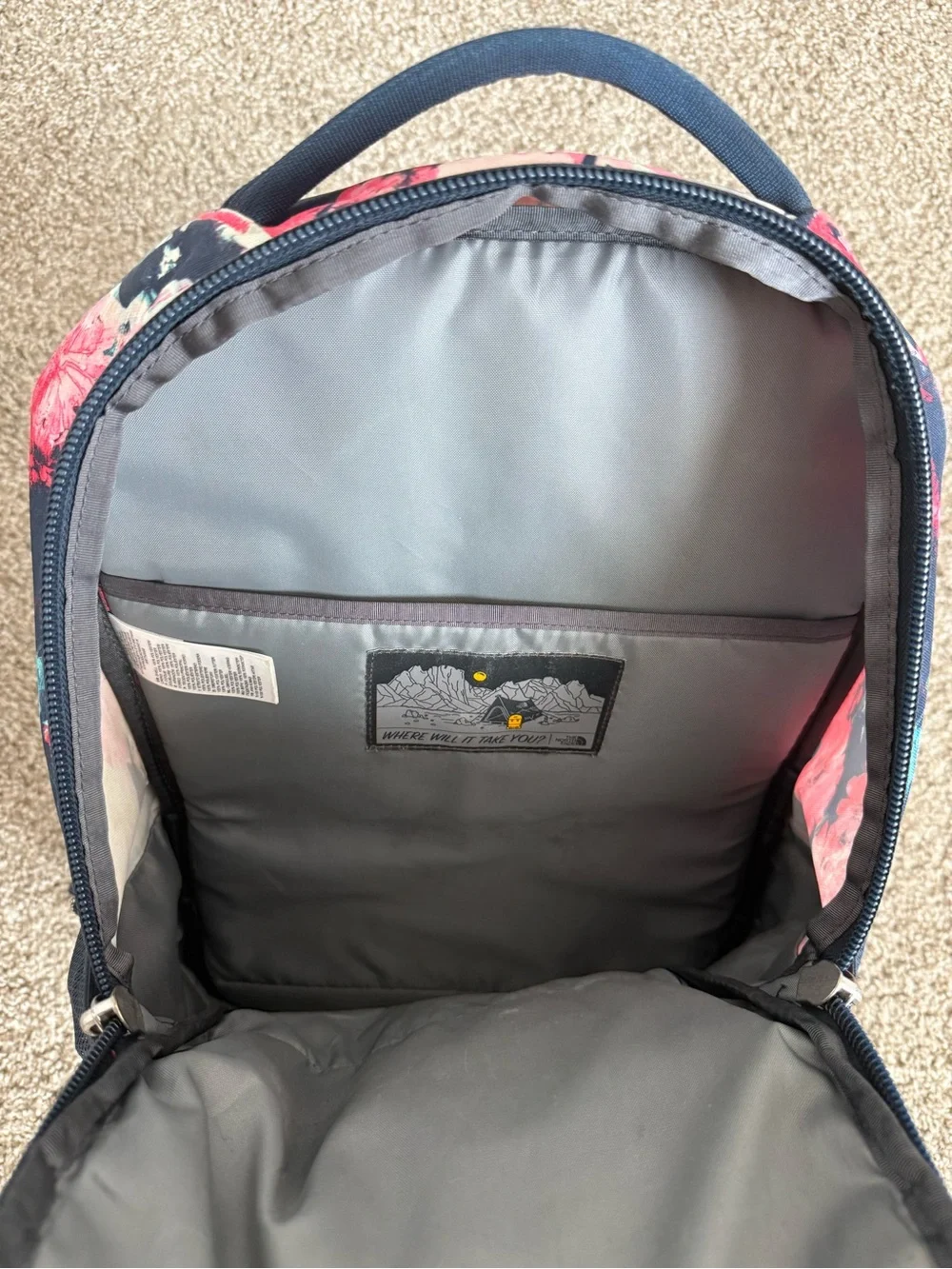 The North Face Navy Backpack with Pink Floral Top